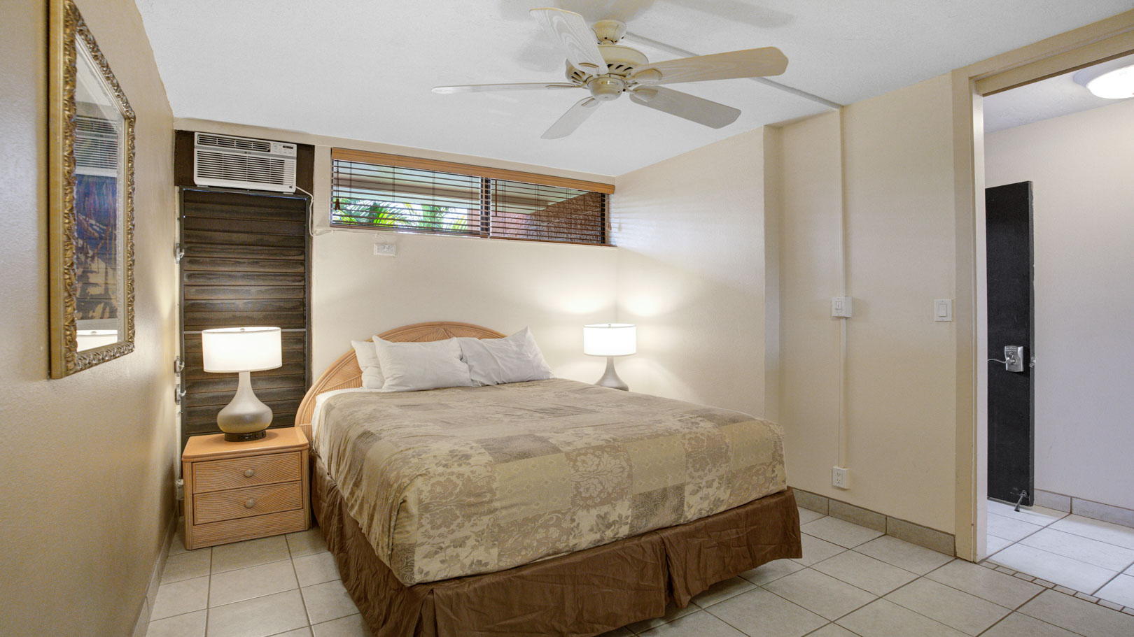 A cozy bedroom at  at VRI's Kuleana Club in Maui, Hawaii.